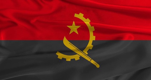 Flag of Angola with fabric textured background. Close up of National flag of Angola with realistic