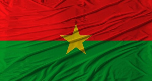 Burkina Faso flag waving. Flag of Burkina Faso with cloth texture