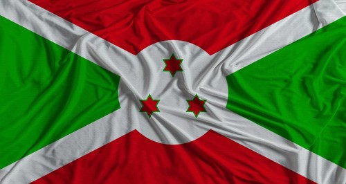 Burundi flag with fabric texture background. National flag of Burundi with cloth texture