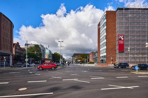 New town hall, general development, brick houses, brick architecture, commercial building, parking