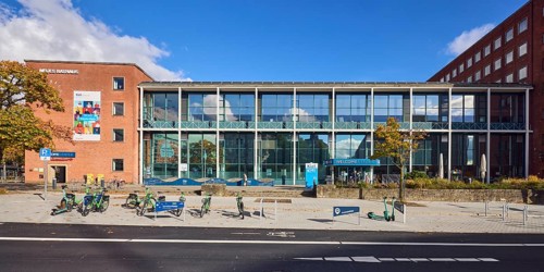 New town hall, tourist information, welcome center, brick building, modern building, glass façade,