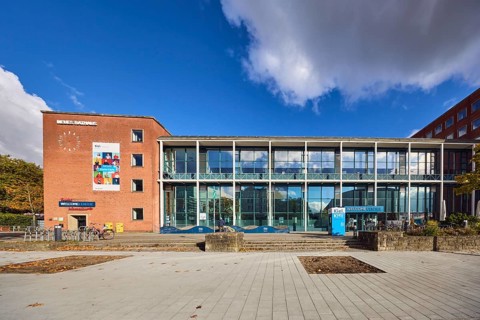 New town hall, tourist information, welcome center, brick building, modern architecture, glass