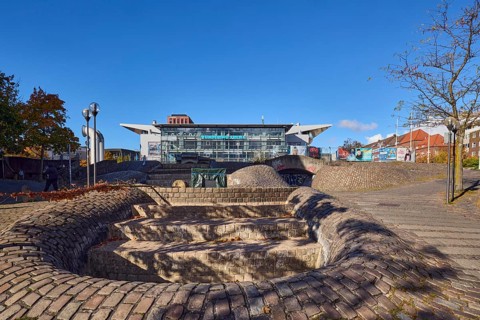 Wunderino Arena multi-purpose hall or former Baltic Sea Hall, pedestrian zone, square, fountain,