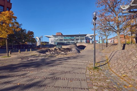 Pedestrian zone, lantern, barrier bollard, multi-purpose hall Wunderino Arena or former Baltic Sea