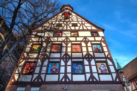 Historic Pilate House with the annual advent calendar in the evening light, Tiergärtnertor,