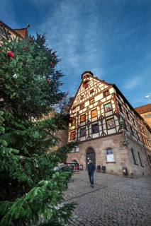 Historic Pilate House with the annual advent calendar in the evening light, Tiergärtnertor,