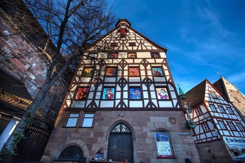 Historic Pilate House with the annual advent calendar in the evening sun, Tiergärtnertor,