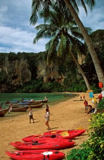 Palm trees, longtail boats, kayaks, people, Ton Sai beach, two years in front of the tsunami,