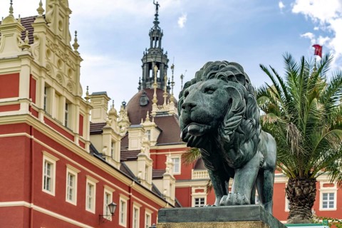 Lion in front of Muskau Castle in the UNESCO World Heritage Site Muskauer Park or Park Muzakowski