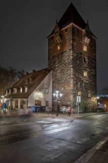 Medieval debt tower in evening lighting, built around 1323, front island of Schütt, Nuremberg,