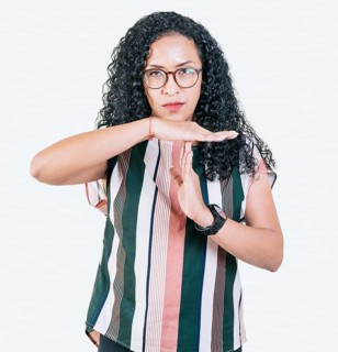 Afro girl gesturing time out isolated. Young afro woman gesturing time out with palms hands