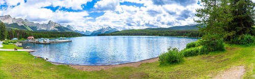 Breathtaking panorama of maligne lake, featuring crystal clear turquoise waters reflecting