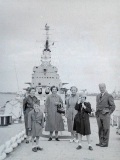 Family group of people on Royal Navy HMS Vanguard battleship, Devonport, Plymouth, Devon, England,