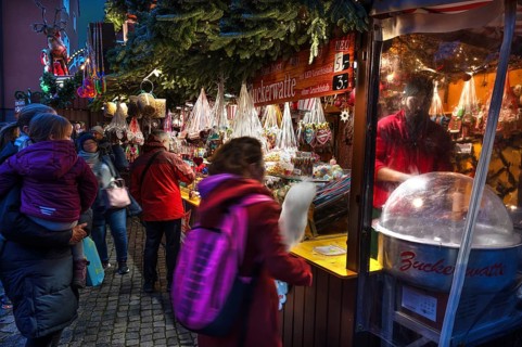 Cotton candy at a candy stand at the Christmas market for children in Nuremberg, Middle Franconia,