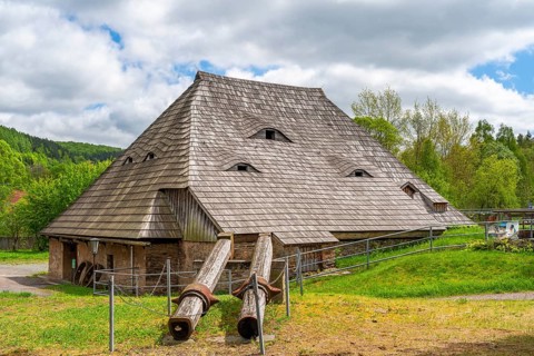 Historic copper hammer mill in a historic house with shingle roof, Museum Saigerhütte Grünthal,