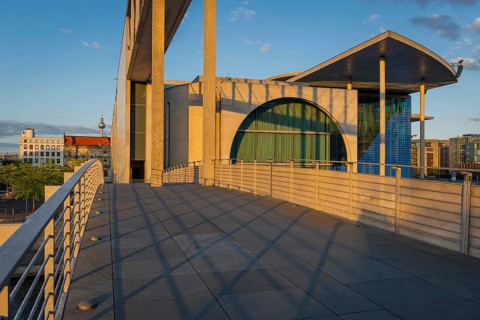 Footbridge with Marie-Elisabeth Lüders House in the evening light on the Spree in the government