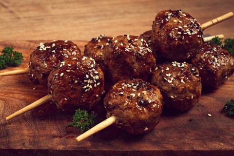 Tsukune, Japanese meatballs, minced chicken, fried on a skewer, with yakitori sauce, homemade, no