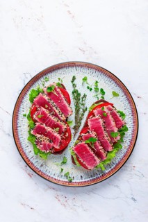 Sandwiches with fried tuna fillet in sesame seeds, breakfast, top view, homemade