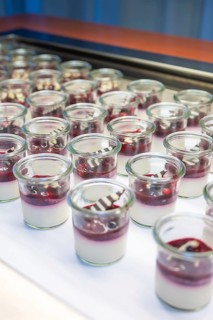 Modern desserts in small glasses, layered with berries, Christmas party Dekra Congresshotel Wart,