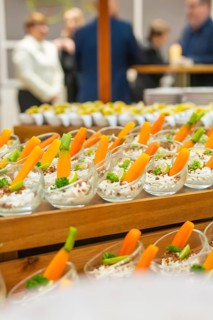 Elegant starter in a glass with carrots and green garnish, Christmas party Dekra Congresshotel