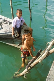 Little boys, children in the stilt village of Ko Pannyi in Phangnga Bay near Ko Phuket, two years