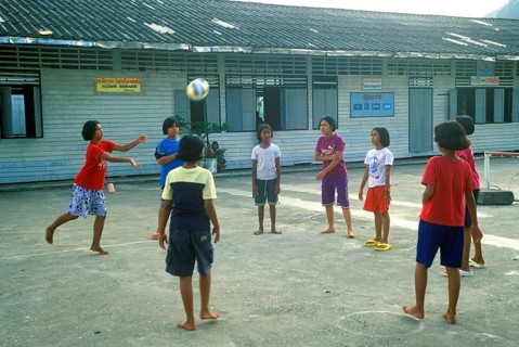 Students in a schoolyard in the stilt village of Ko Pannyi in Phangnga Bay near Ko Phuket, two