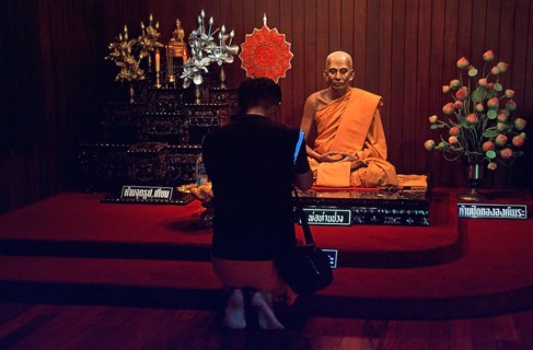 Wax monk at Wat Chalong monastery, believer praying, Ko Phuket, Thailand, December 2002, vintage,