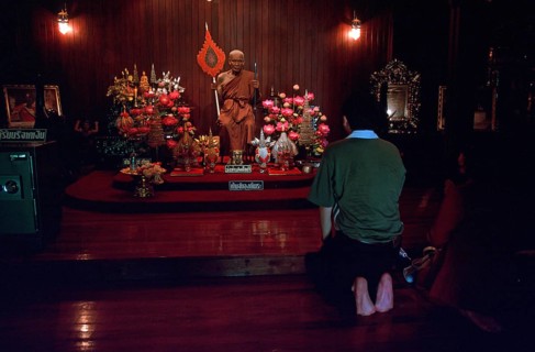 Wax monk at Wat Chalong monastery, believers praying, Ko Phuket, Thailand, December 2002, vintage,