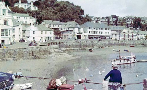 Historic waterfront buildings around the harbour at St Mawes, Cornwall, England, UK c 1960