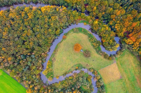 The river Hunte snakes through an autumn landscape, aerial view vertical aerial view, Huntetal,