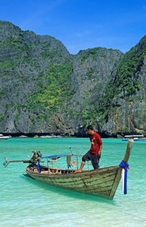 Boatmaster, longtail boat on Maya Bay beach, known for the movie The Beach, one year in front of
