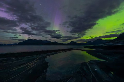 The Vestfjord in Nordland, Norway, has an enchanting atmosphere at night. Dark clouds and vivid