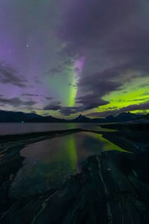 The Vestfjord in Nordland, Norway, has an enchanting atmosphere at night. Dark clouds and vivid