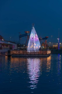 Christmas decoration in Kiel at the boat harbor, festive lighting, glow of lights, evening,