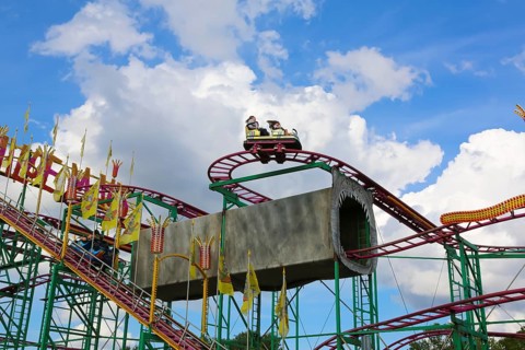 Wilde Maus, little rollercoaster for children, fairground in Friedrichsau Ulm, public festival,