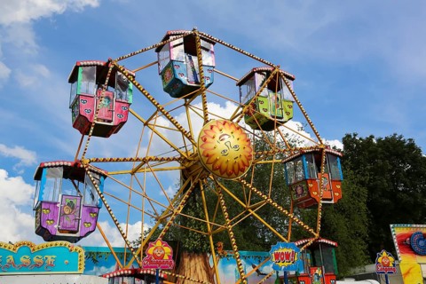 Small Ferris wheel for children, fairground in Ulm Friedrichsau, folk festival, hustle and bustle,