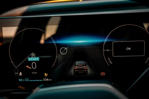 Modern cockpit display of an electric car with blue light effects, Deer E-Carsharing, Renault