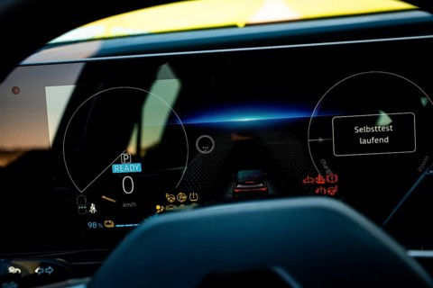 Modern digital car dashboard with various displays in a nocturnal atmosphere, Deer e-Carsharing,