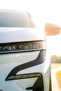 Modern white car body viewed from the front in sunlight, Deer e-Carsharing, Renault Megane, Calw,