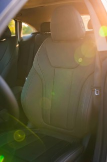 Front passenger seat of a modern car with lighting effects for a relaxed atmosphere, Deer