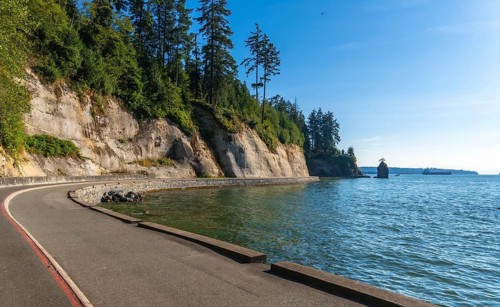 Breathtaking view of the scenic road winding along the coastline in stanley park. Vancouver.