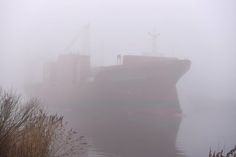 Freighter STADIONGRACHT in fog in the Kiel Canal, NOK, Kielkanal, Kielcanal, Schleswig-Holstein,