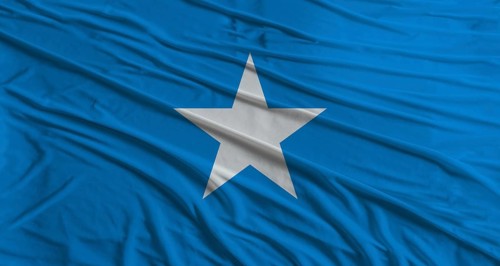 Somalia flag waving. Flag of Somalia with cloth texture
