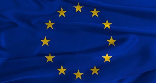 Flag of the European Union with fabric textured background. Close up of National flag of the