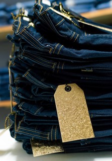 Close up of blue jeans on others with copy space, Various jeans on others with space for text,