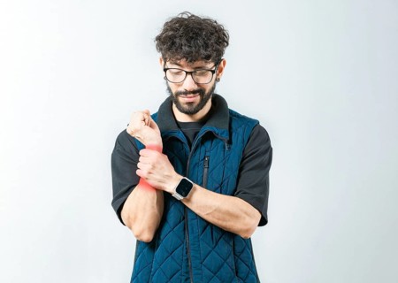 Person with wrist pain and arthritis isolated. Young man with arthritis isolated.. Wrist pain and