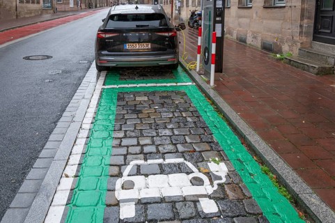 Electric car charging at a marked charging station in the inner city, Fürth, Middle Franconia,