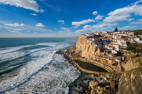 Charming seaside village of Azenhas do Mar perched on cliffs above the Atlantic Ocean. Enjoy