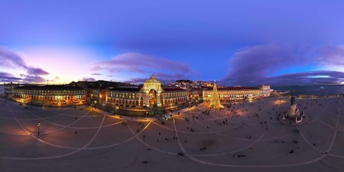 360 degrees aerial panorama of winter twilight at Praca do Comercio in Lisbon, featuring a stunning