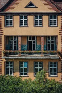 Façade with balcony and flower boxes, Lost Place, Heilstätten Beelitz, Brandenburg